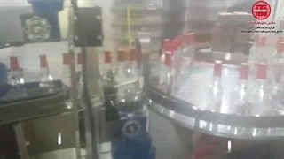 دستگاه پرکن شیشه 10 نازل درب پیلفرپروف توان صنعت / 09152000050