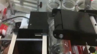 لیبل چسبان نیمه اتومات 305مخصوص ظروف گردمحصول سپندافزار