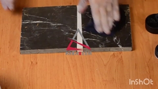 اجرای واکس سنگ پاراوکس بلک بر روی مرمریت گلدن بلک