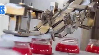 دستگاه پرکن و دربند شیشه عسل،سس،ترشی توان صنعت / 09152000050