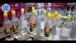 دستگاه پرکن دربند گلاب و عرقیات منو بلوک توان صنعت / 09152000050